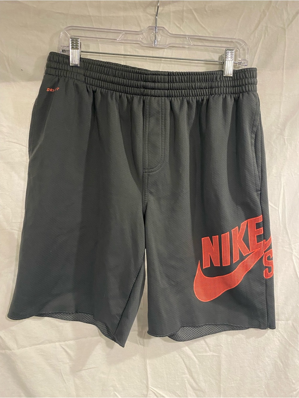Nike Men’s Dri-FIT Athletic Shorts — Charcoal with Orange Logo. Large
